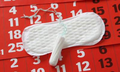 от чего может болеть спина после месячных