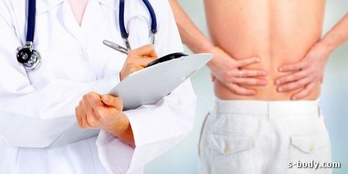 спина болит после приседа